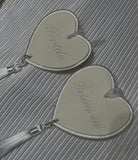 Two heart shaped personalised charms for brides and bridesmaids 