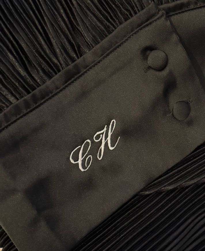 Black pjs  with white embroidered initials on cuff