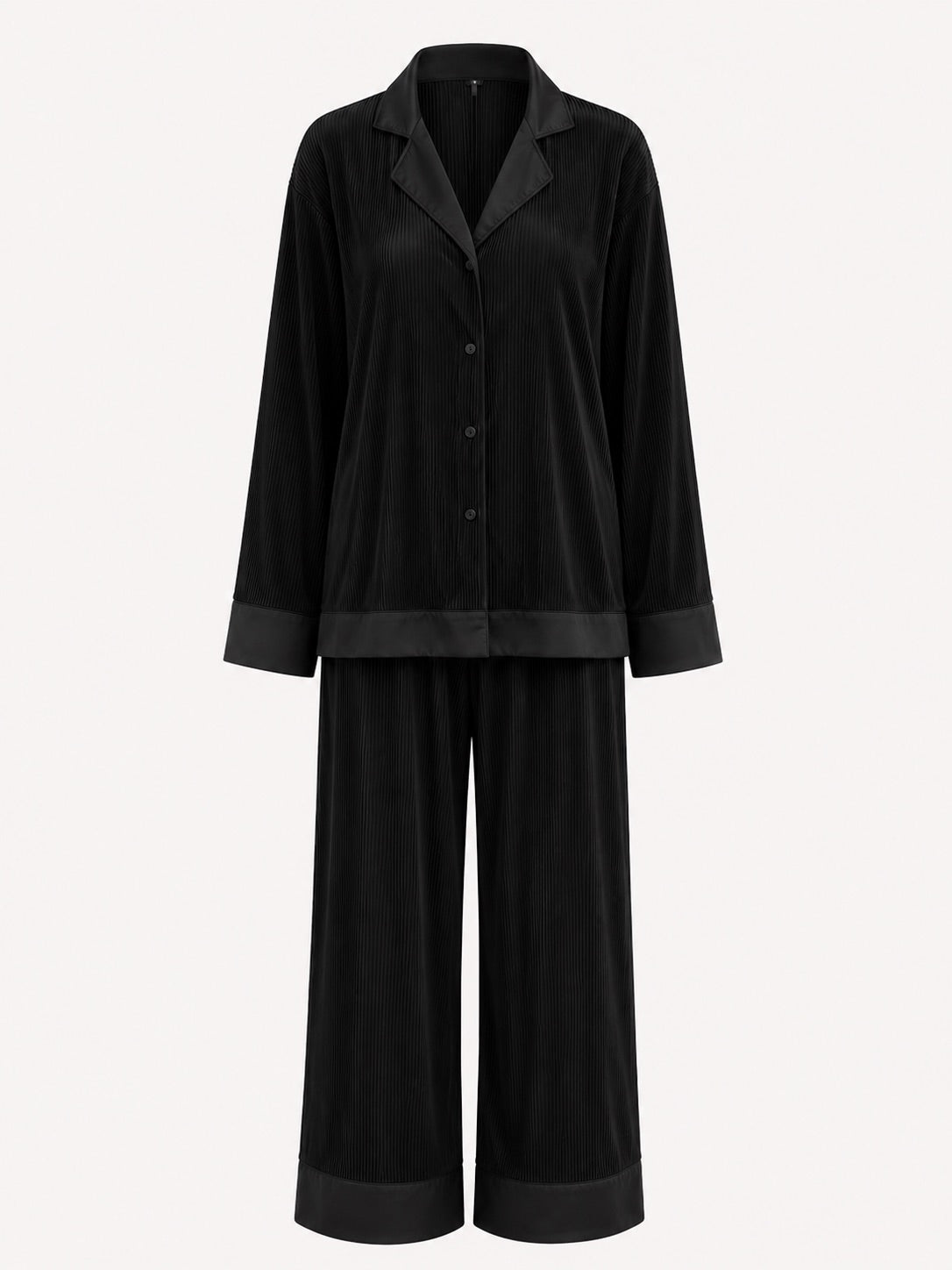 A two-piece black pajama set featuring a long-sleeve button-front shirt with a satin-like finish and wide-leg pants, shown against a plain light background.