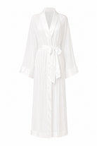 A white long-sleeved silk robe with a shawl collar, tie belt, and subtle vertical pleats, shown against a plain white background.
